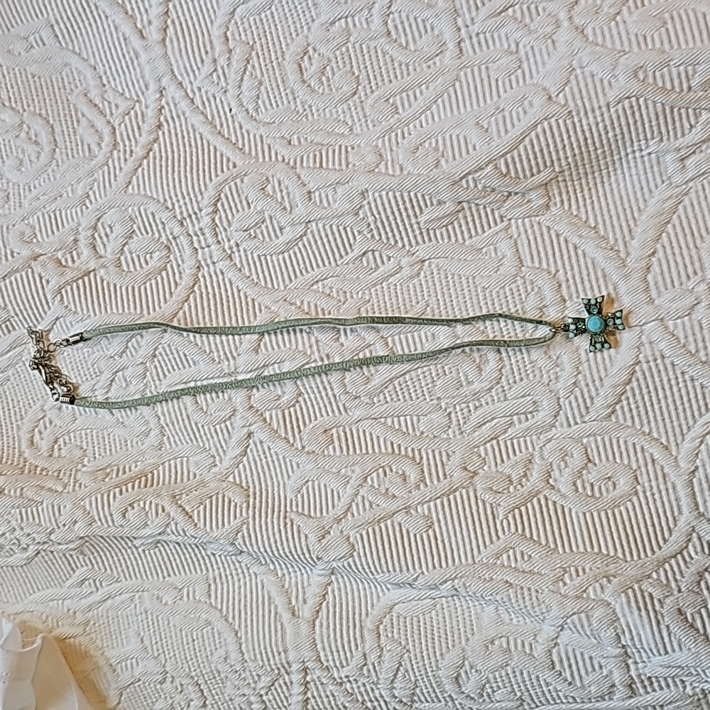 Turquoise cross